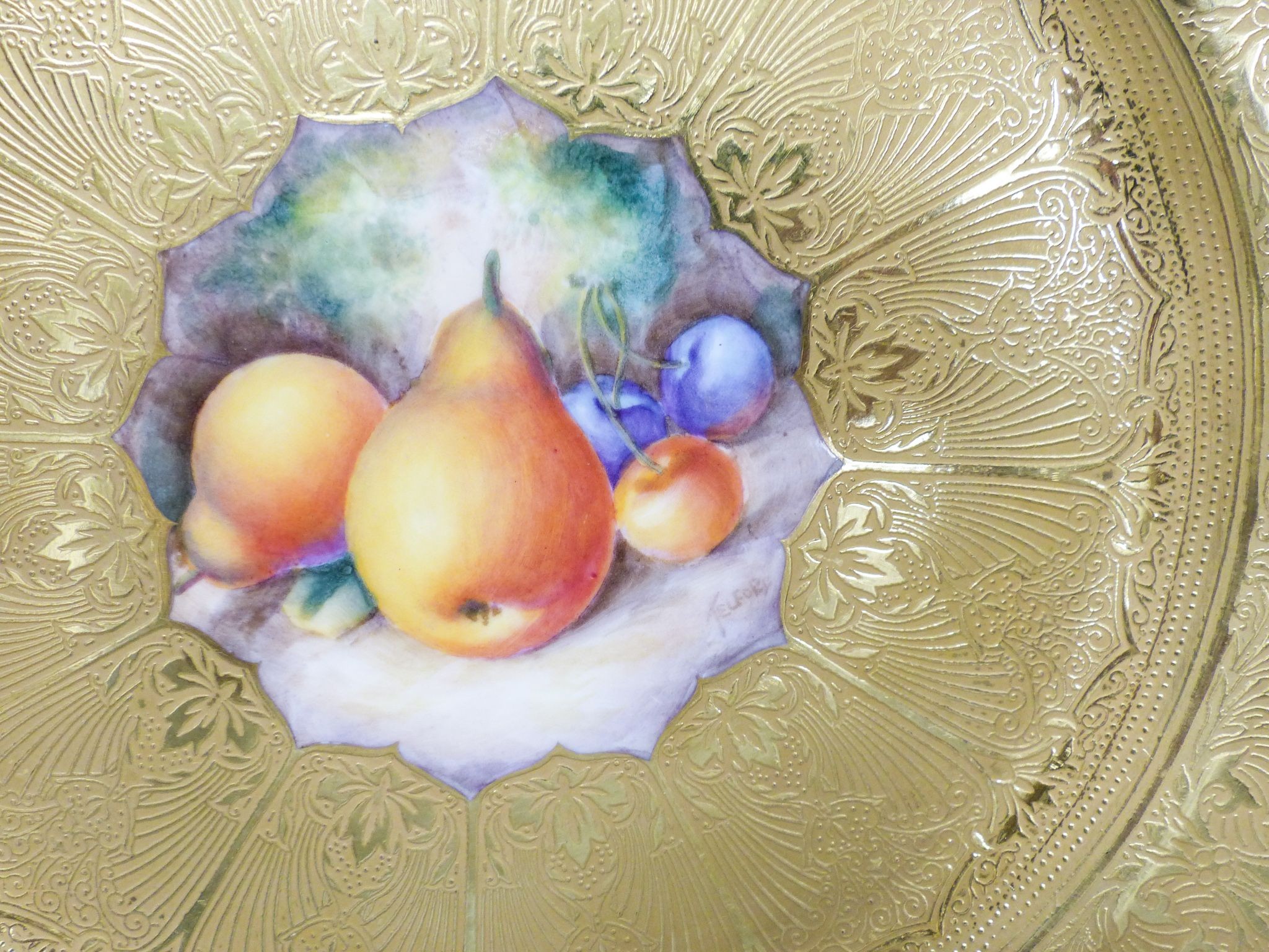 A Royal Worcester fruit painted and gilt tooled cabinet plate, post war, signed Telford, 27.5 cm